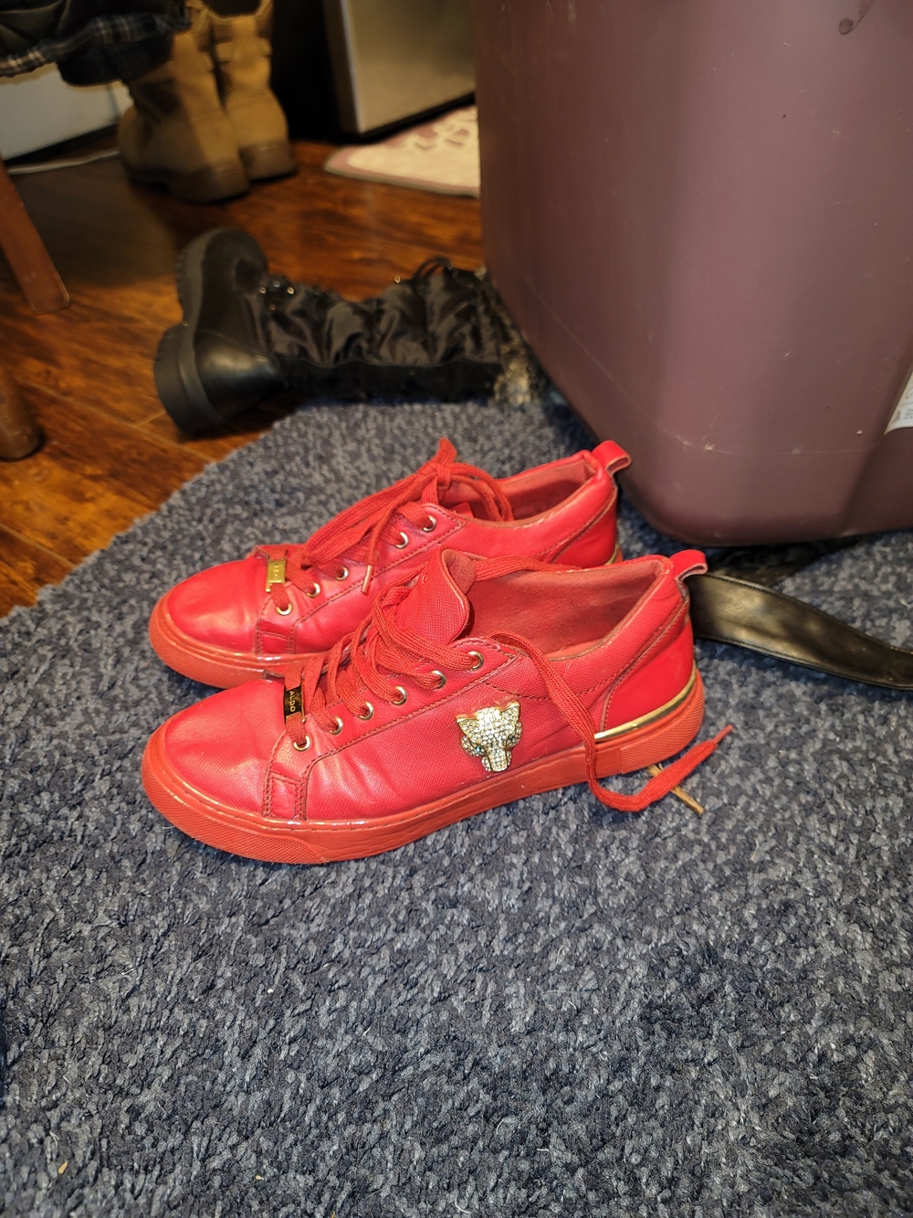 Aldo Red Low-Top Sneakers with Gold Trim and Crystal Animal Accent